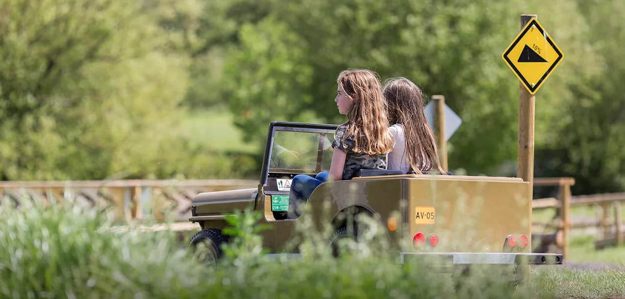 Children riding mini quad bikes on the outdoor track at Avon Valley Adventure Park