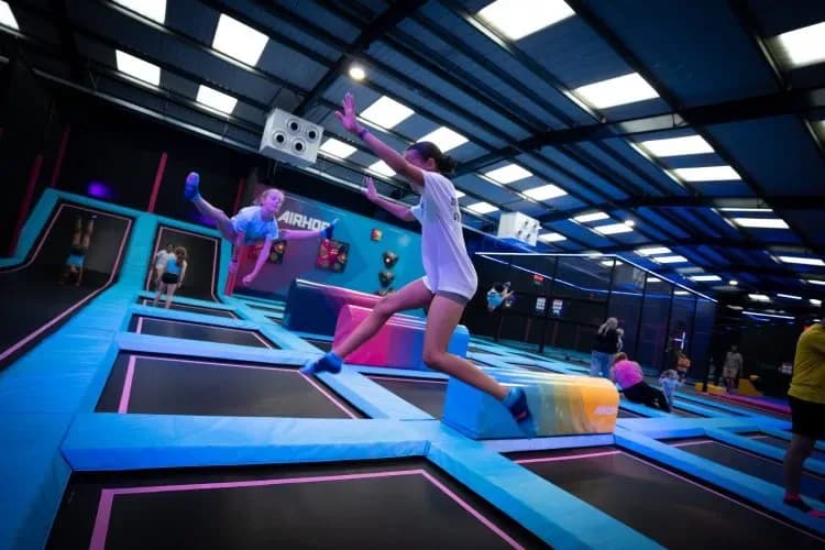 Children jumping on trampolines at AirHop Bristol adventure park