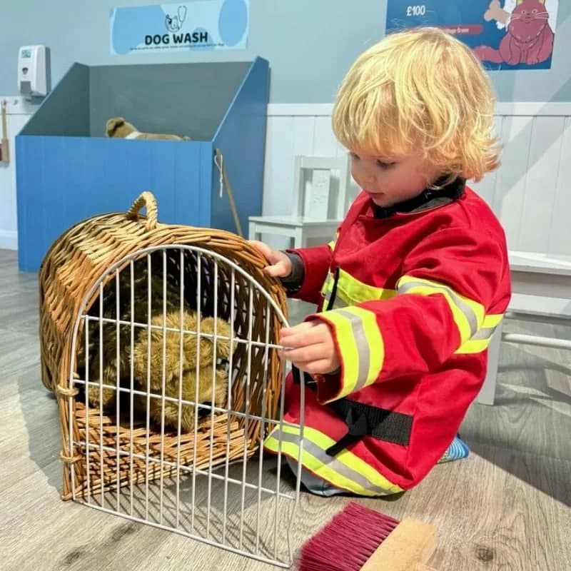 Role play vets at Discovery Village - children care for toy animals