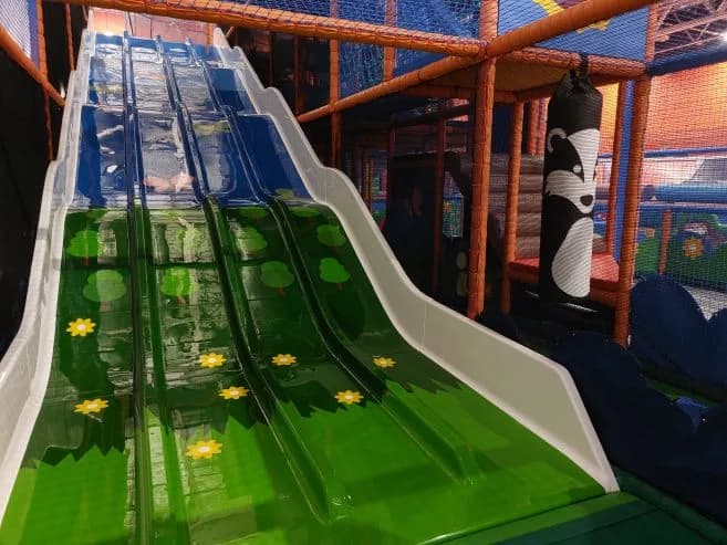 Multi-level soft play structure with colourful slides and climbing frames at Link Centre