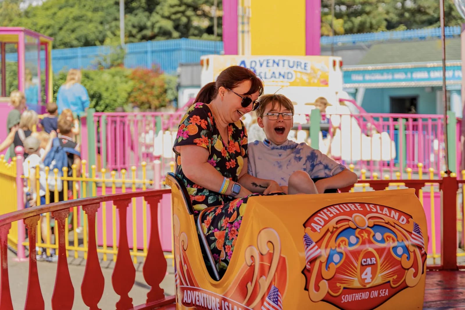 Visitors enjoying a ride car branded Adventure Island Southend-on-Sea