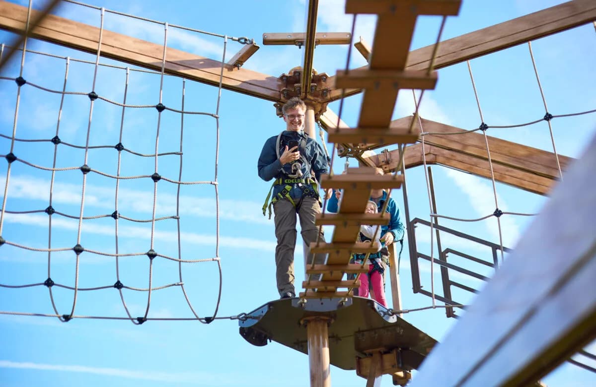 Person on the Sky Ropes high ropes course at Great Notley Country Park