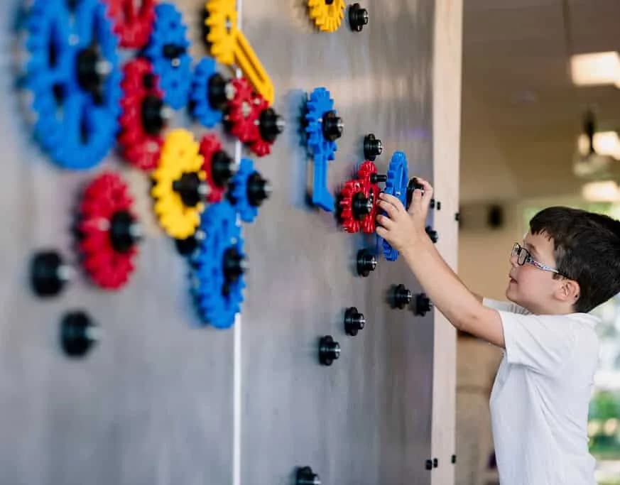 Children enjoying interactive exhibits at Cambridge Science Centre