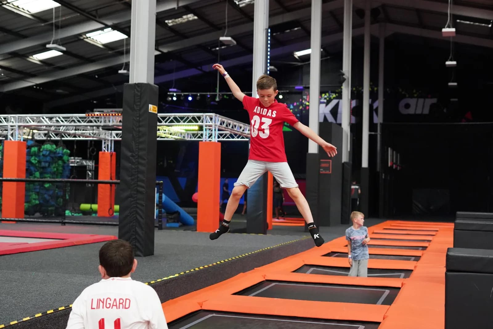 Action zone at KICKair Manchester with trampolines and inflatable obstacles