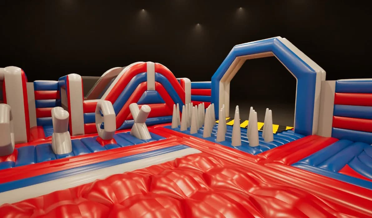 Indoor inflatable ninja obstacle course at Total Ninja Manchester with red, blue and white bouncy obstacles