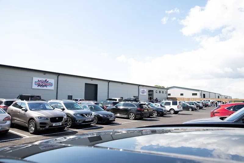 Exterior of Fun Arena UK showing the main building entrance and parking