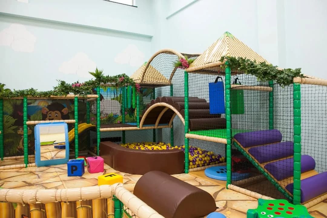 Main jungle-themed soft play structure at Roar and Explore, Belfast