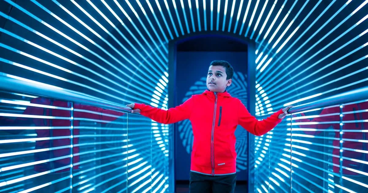 W5 — infinity tunnel of blue LED lights