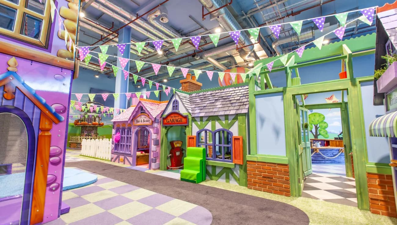 Soft play role-play village with Fun Street Garage playhouse inside Fun Street Silverburn, Glasgow