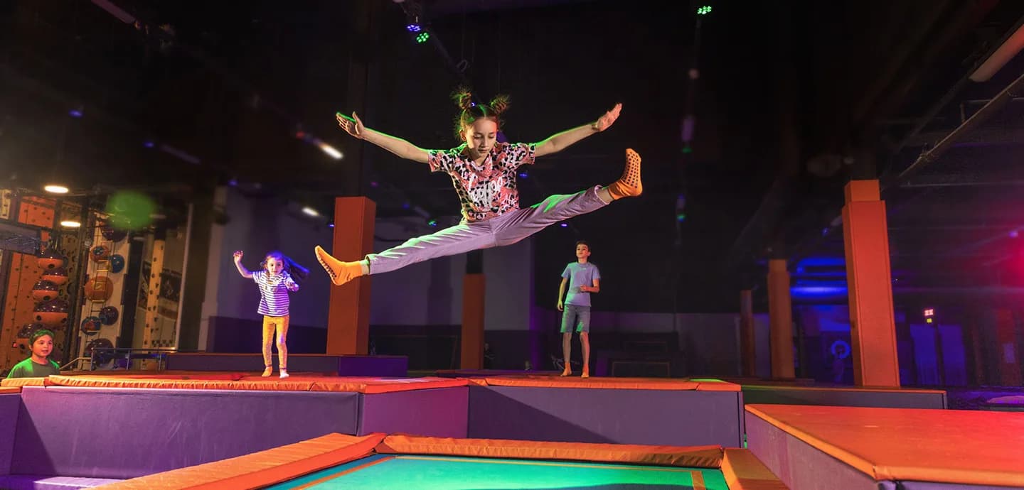 Children bouncing on trampolines at Gravity Active Glasgow