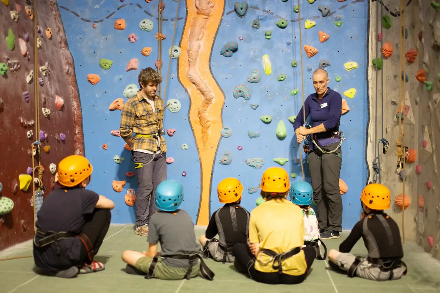 A group of kids learning to climb at Alien Rock climbing centre in Edinburgh