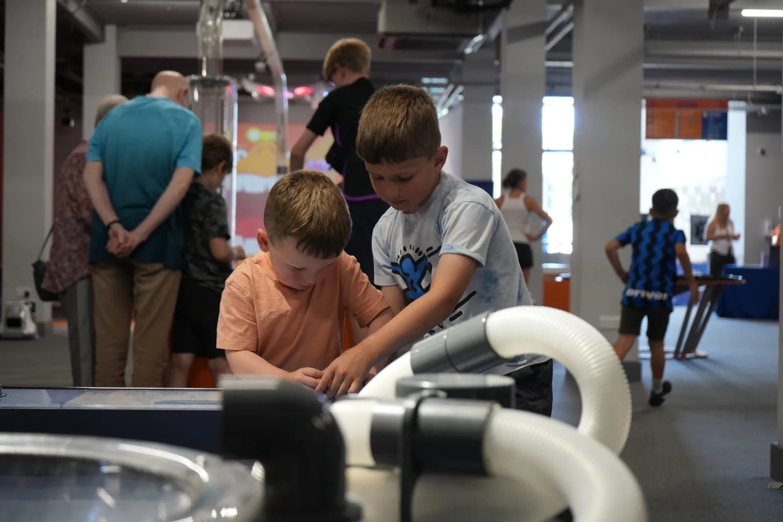 Family playing at Aberdeen Science Centre space zone