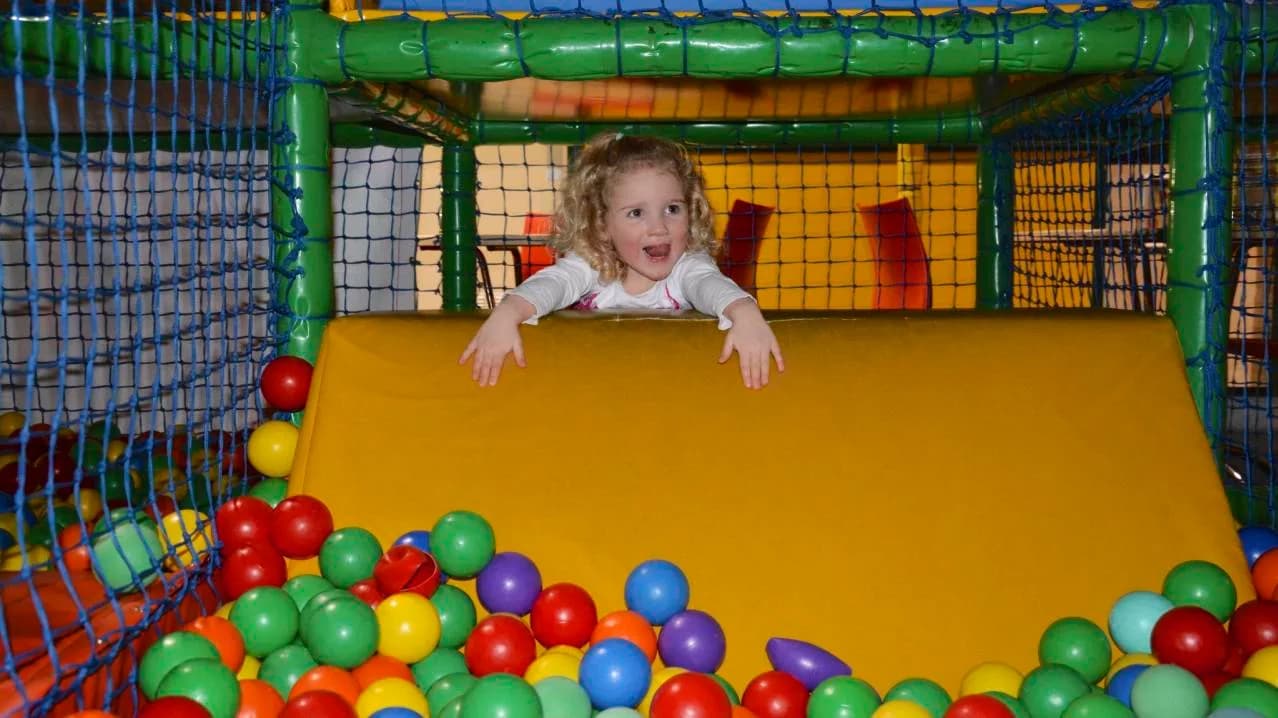 Girl going into ball pit at Funderzone Indoor Soft Play Centre in Barnstaple