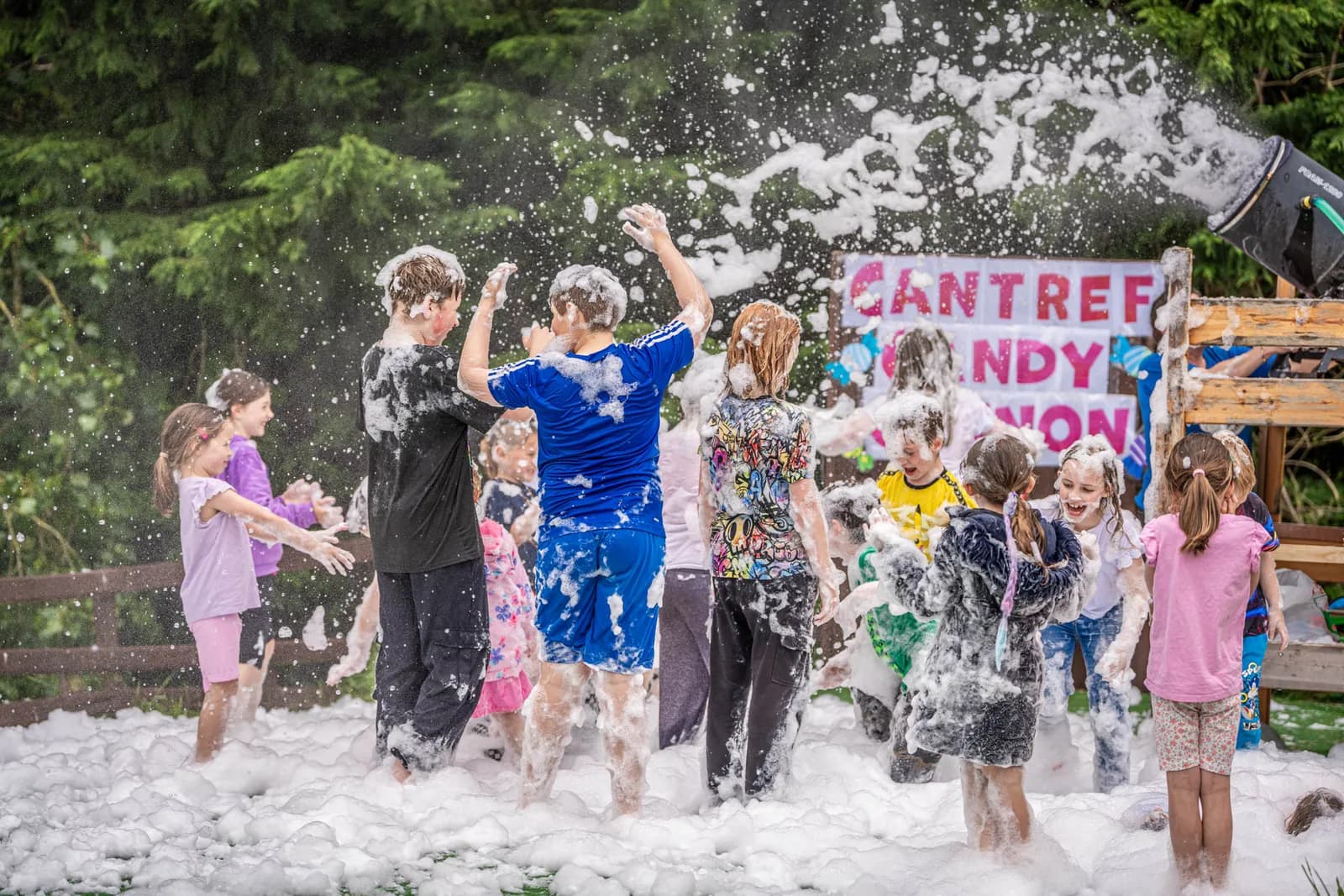 Children enjoying foam party fun at Cantref Adventure Farm
