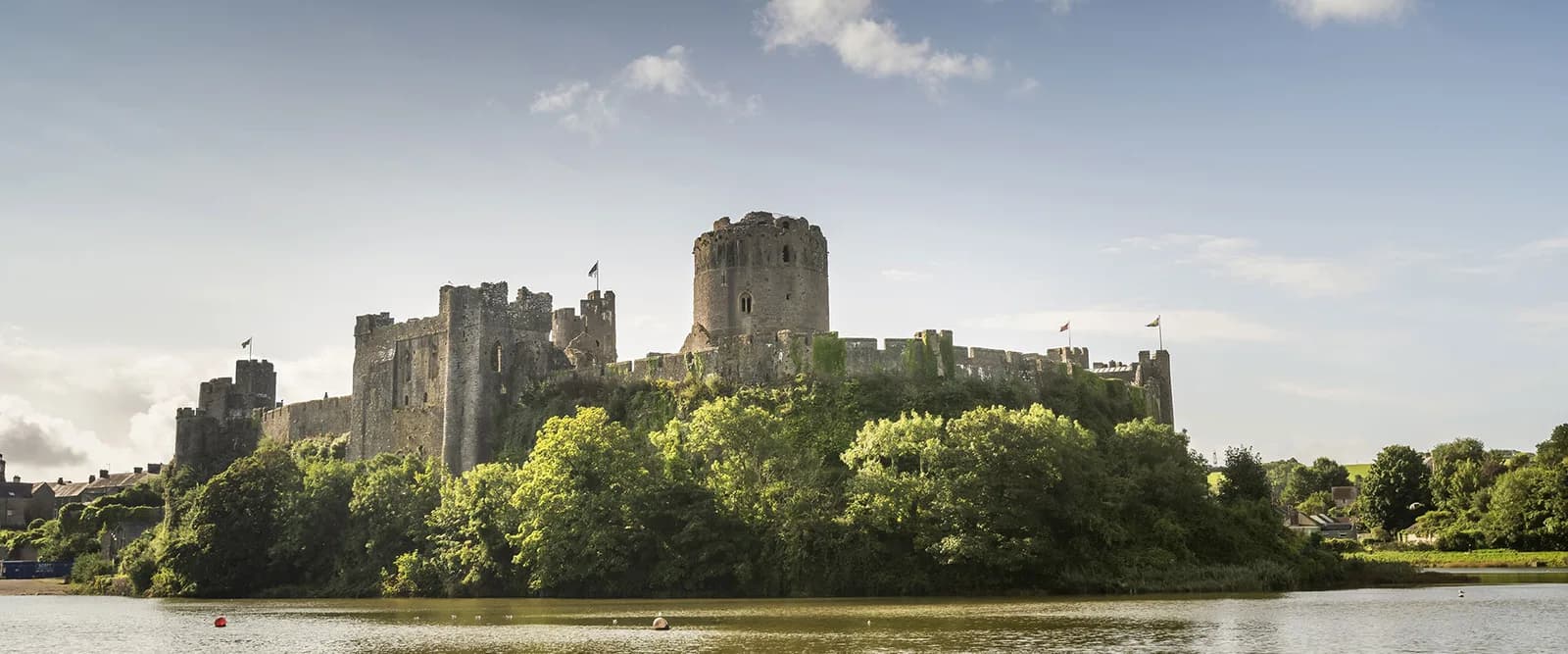Pembroke Castle aerial view — massive medieval fortress on the Milford Haven waterway