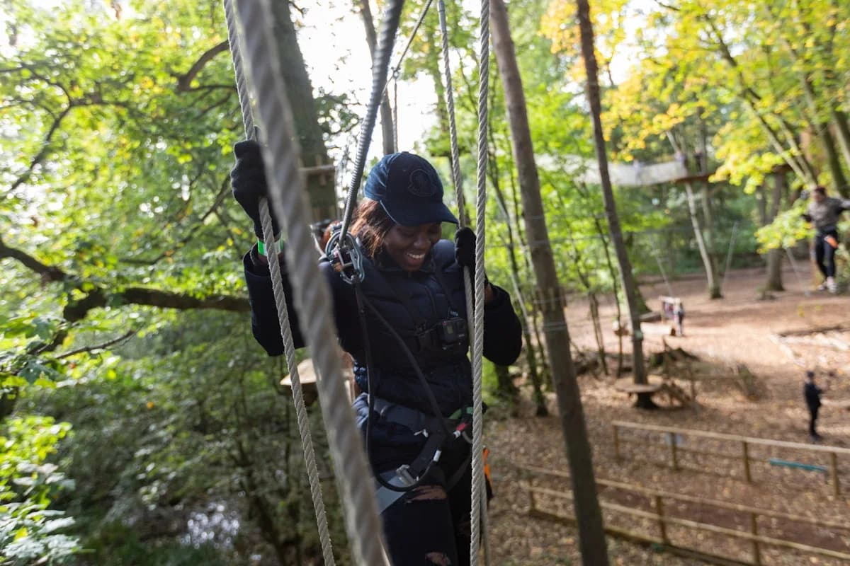Person on a high ropes course at Go Ape Coventry in Coombe Abbey Park