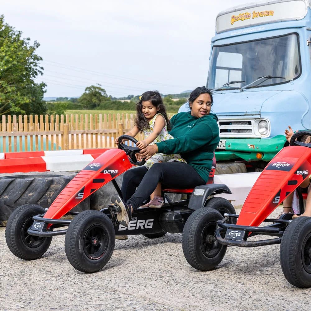 Mum and daughter on go kart at Churchfields Farm