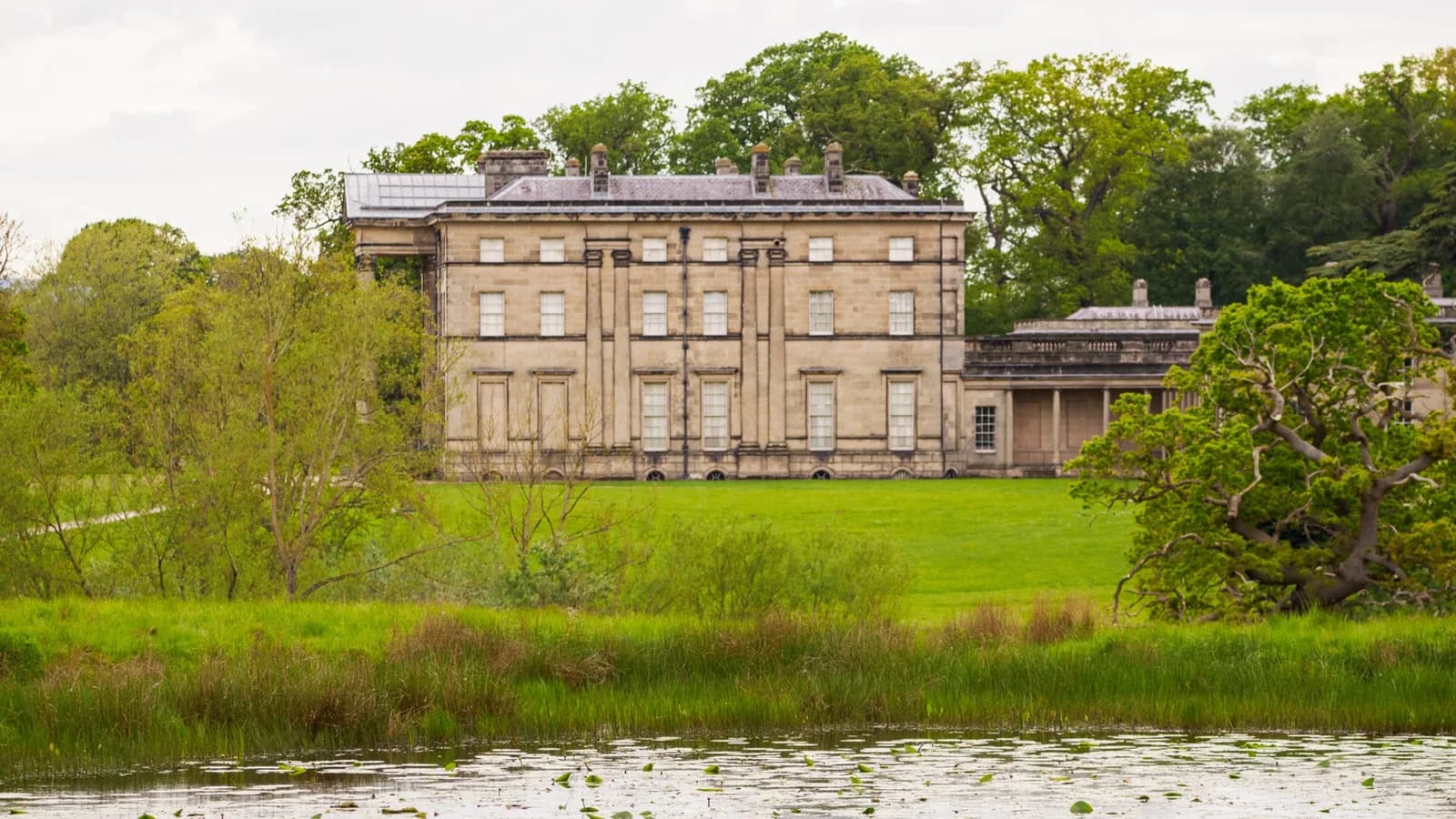 Attingham Park mansion in spring seen from the deer park