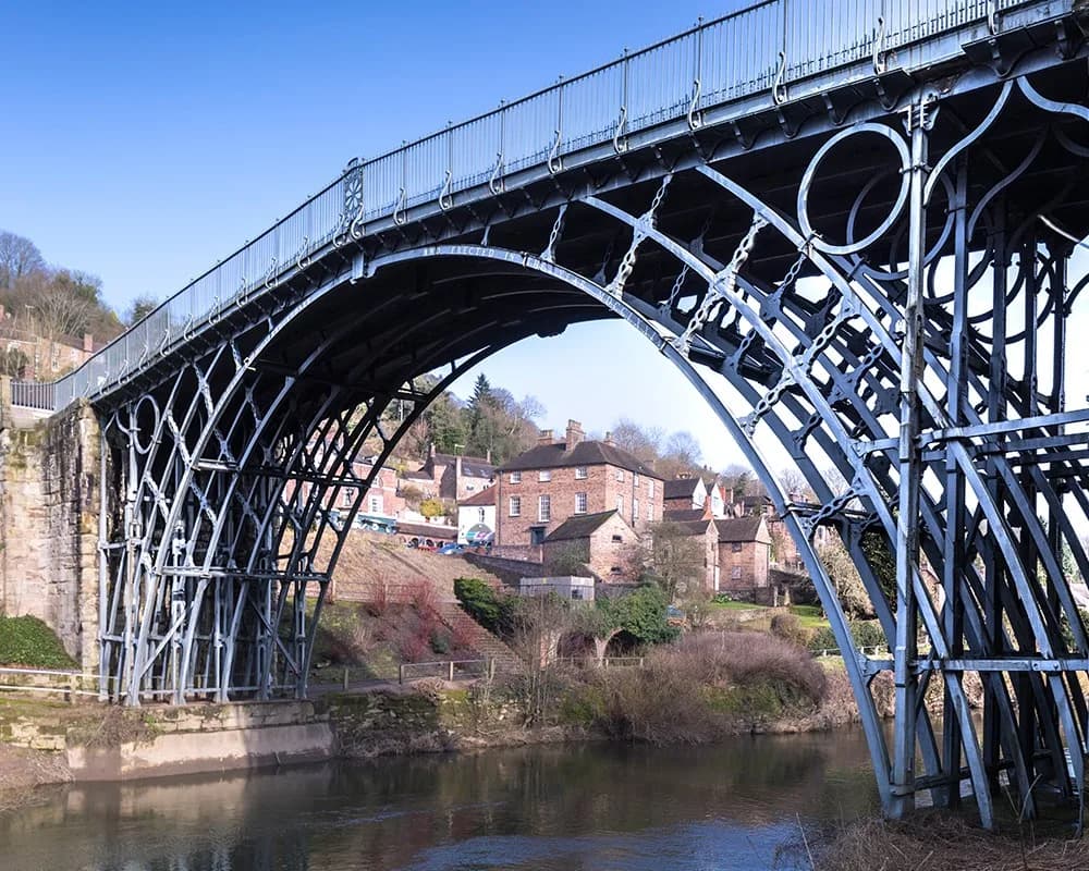 The Iron Bridge from water level with the town of Ironbridge behind