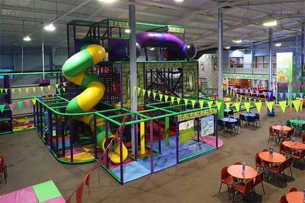 Children playing in the 3-storey soft play frame at Krazy Kingdom