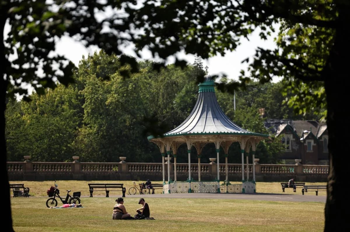 Leazes Park lake with trees and greenery in Newcastle city centre