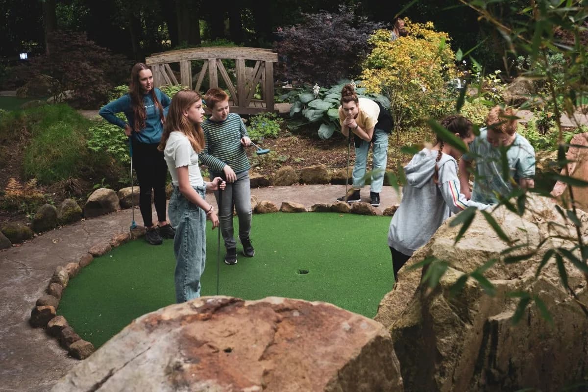 The Forgotten Garden Adventure Golf course at The Alnwick Garden showing themed obstacles and ruins