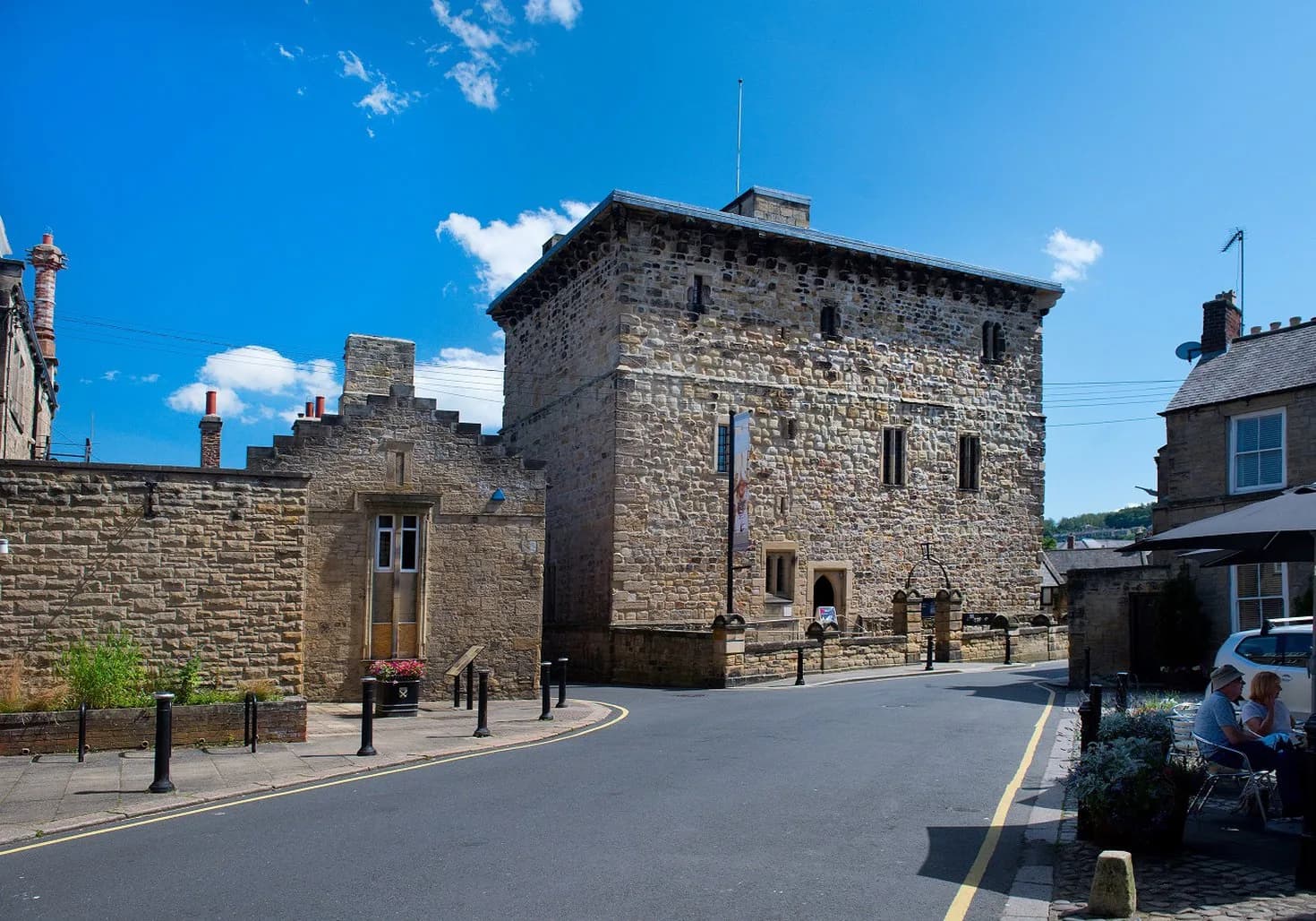 Exterior view of Hexham Old Gaol, a medieval stone building on Hallgate in Hexham