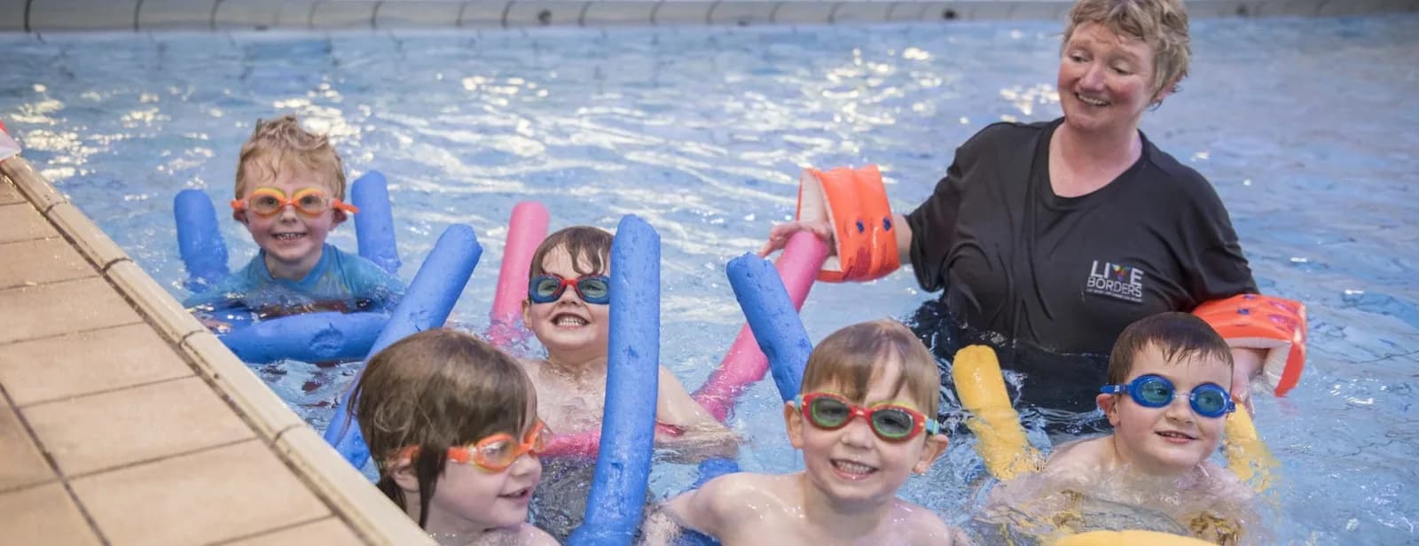 Children swimming at Peebles Swimming Pool