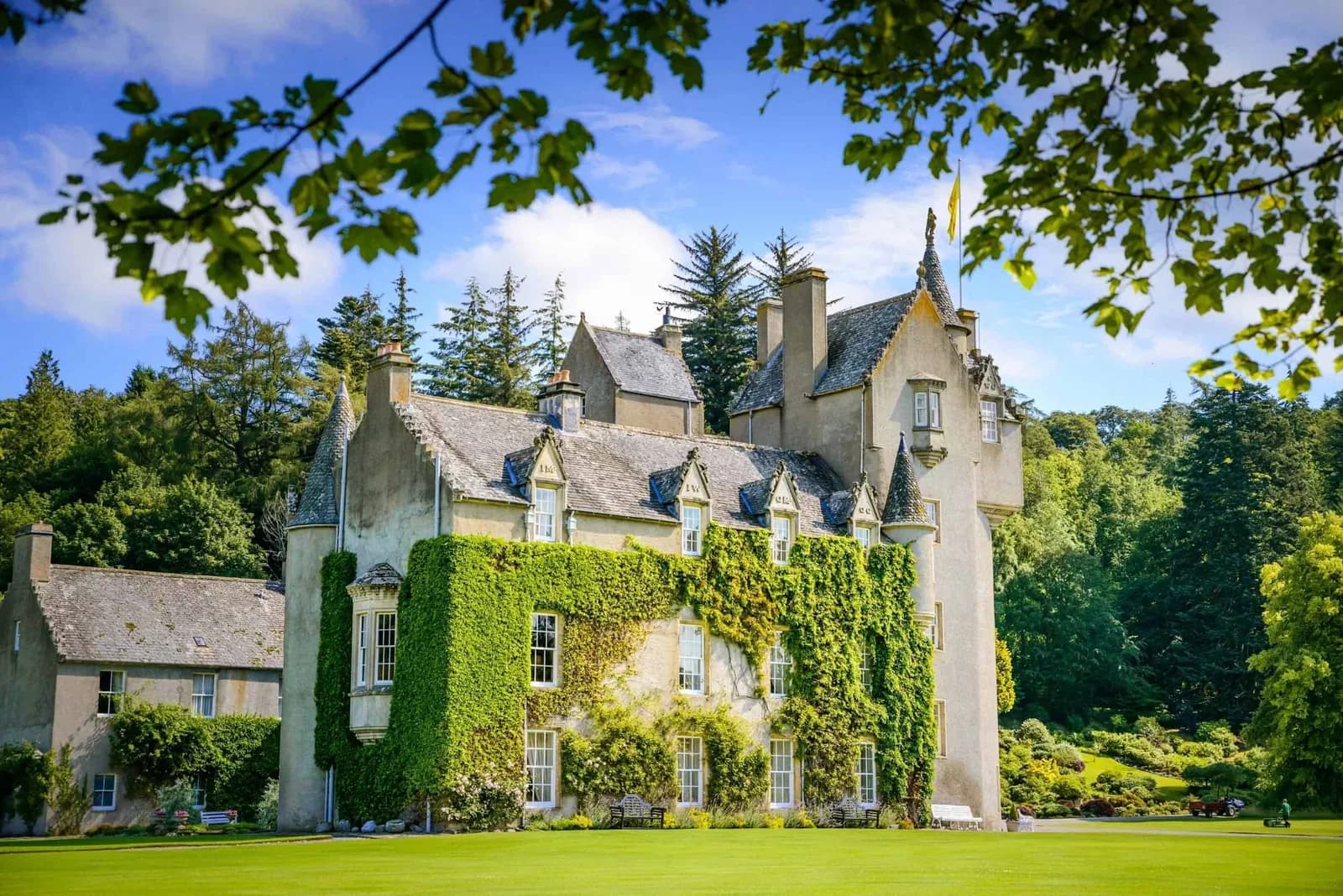Ballindalloch Castle front view with ivy-clad facade and manicured lawns