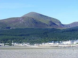 View of Newcastle and Slieve Donard mountain from the beach