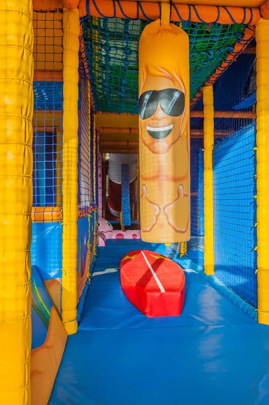 Colourful soft play frames and slides at Lets Explore indoor play centre, Horley
