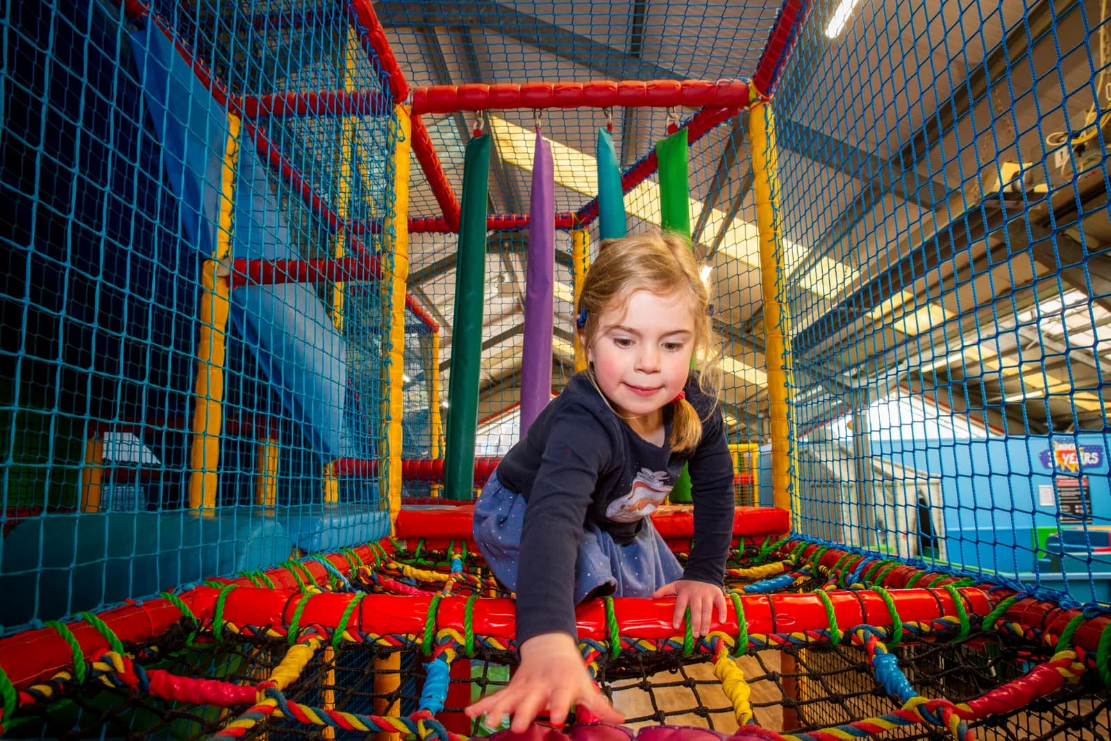 Children playing in the indoor Playzone soft play at Paradise Park Newhaven