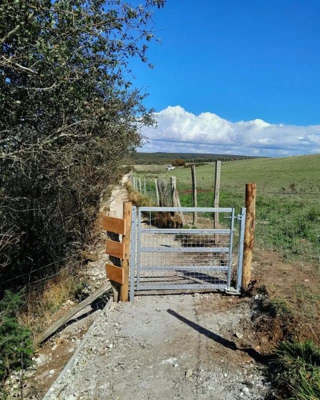 Countryside footpath through farmland near Cuckmere Haven