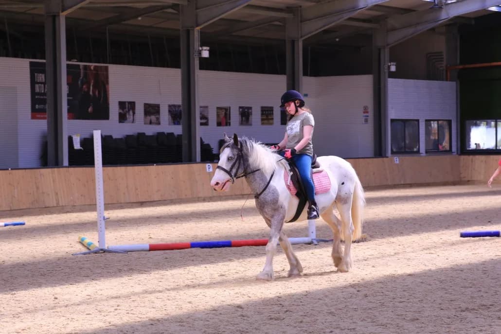 Young rider on a pony at Island Riding Centre, Newport, Isle of Wight