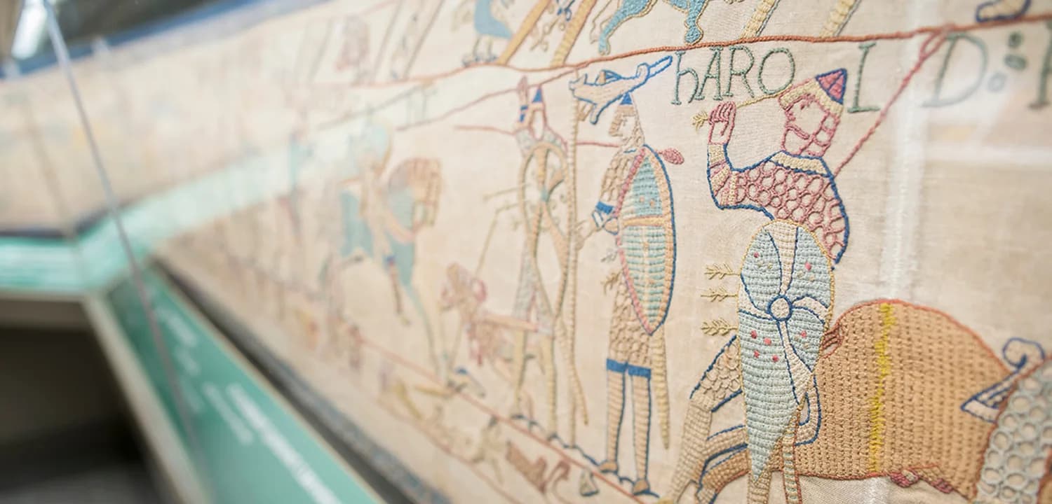 Bayeux Tapestry Gallery at Reading Museum, showing the Harold scene of Britain's Bayeux Tapestry replica