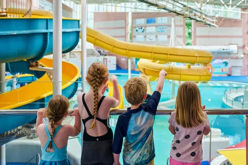 Indoor leisure pool at Perth Leisure Pool with colourful flumes and slides