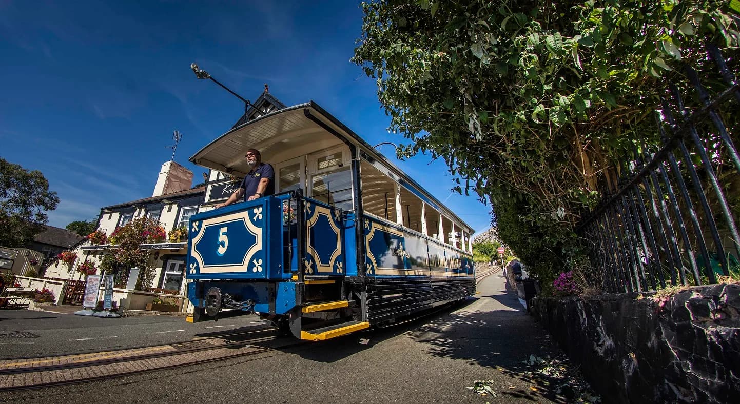 Vintage cable tram of the Great Orme Tramway climbing the streets of Llandudno