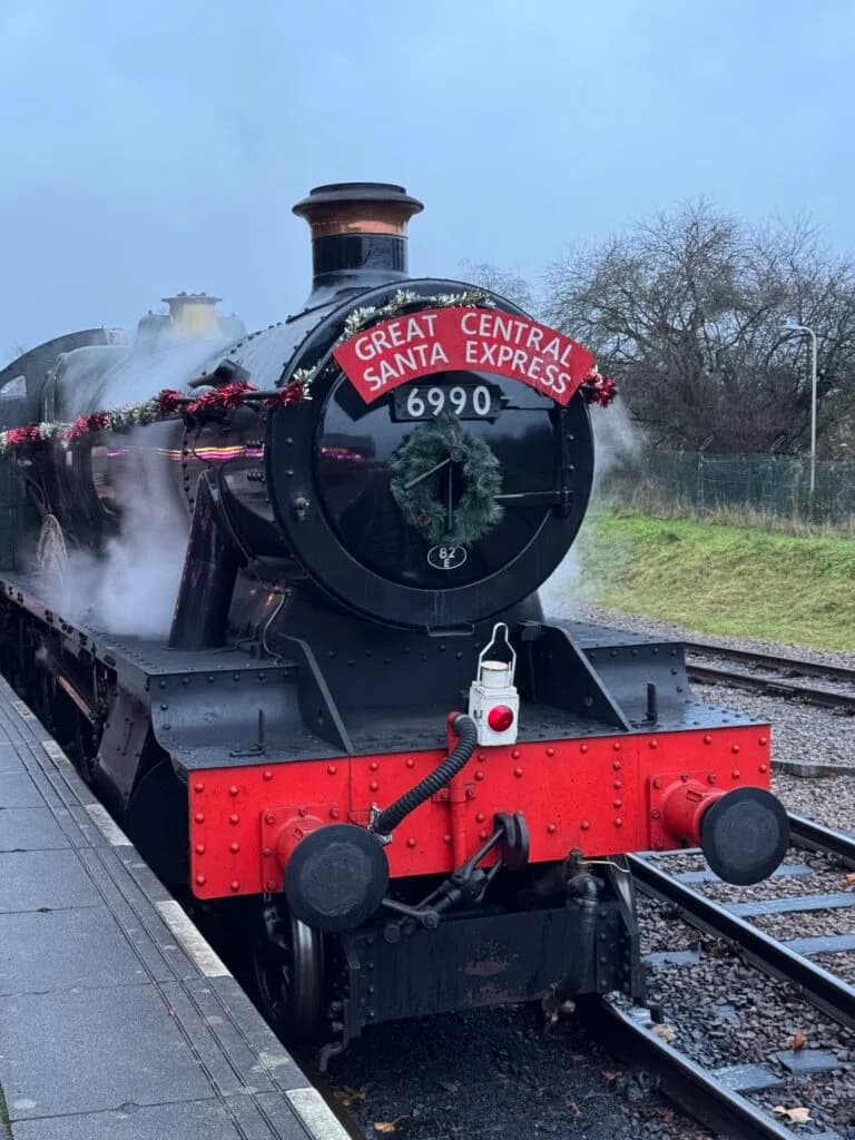 GCR Santa Express steam locomotive 6990 at Loughborough Central platform