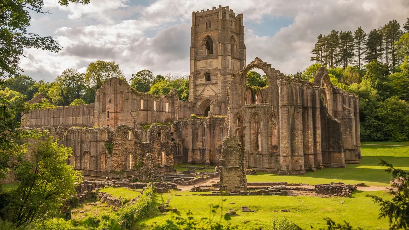 The ruins of Fountains Abbey seen from De Grey's Walk viewing deck