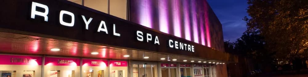 Royal Spa Centre exterior at night with illuminated ROYAL SPA CENTRE sign, Newbold Terrace, Leamington Spa