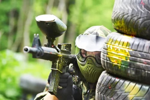 Paintball players in action at Skirmish Paintball Nottingham, Sherwood Forest