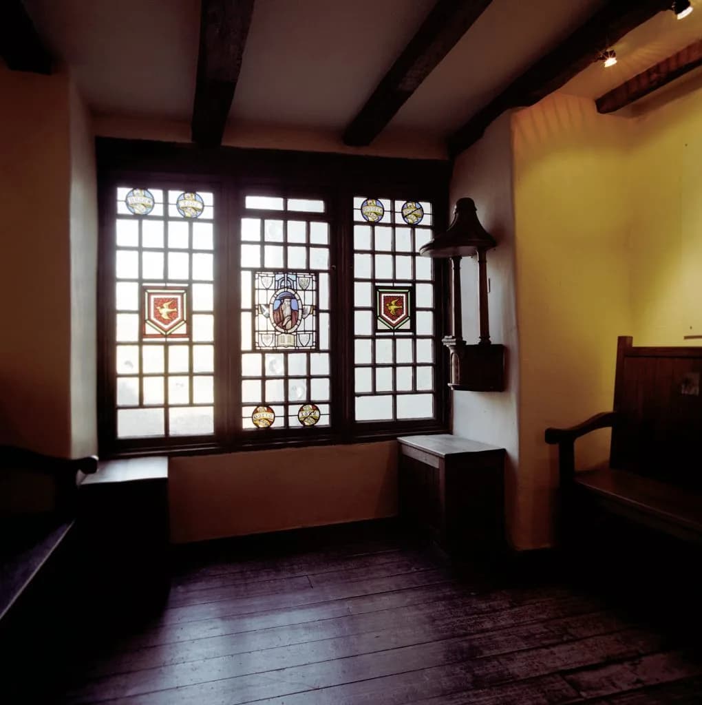 Ornate painted window inside John Knox House