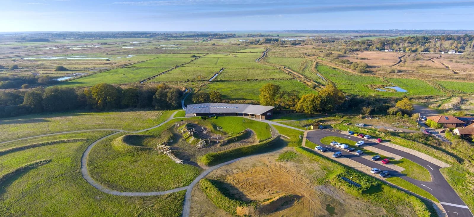 Aerial view of Carlton Marshes visitor centre set in the vast marshland landscape near Lowestoft
