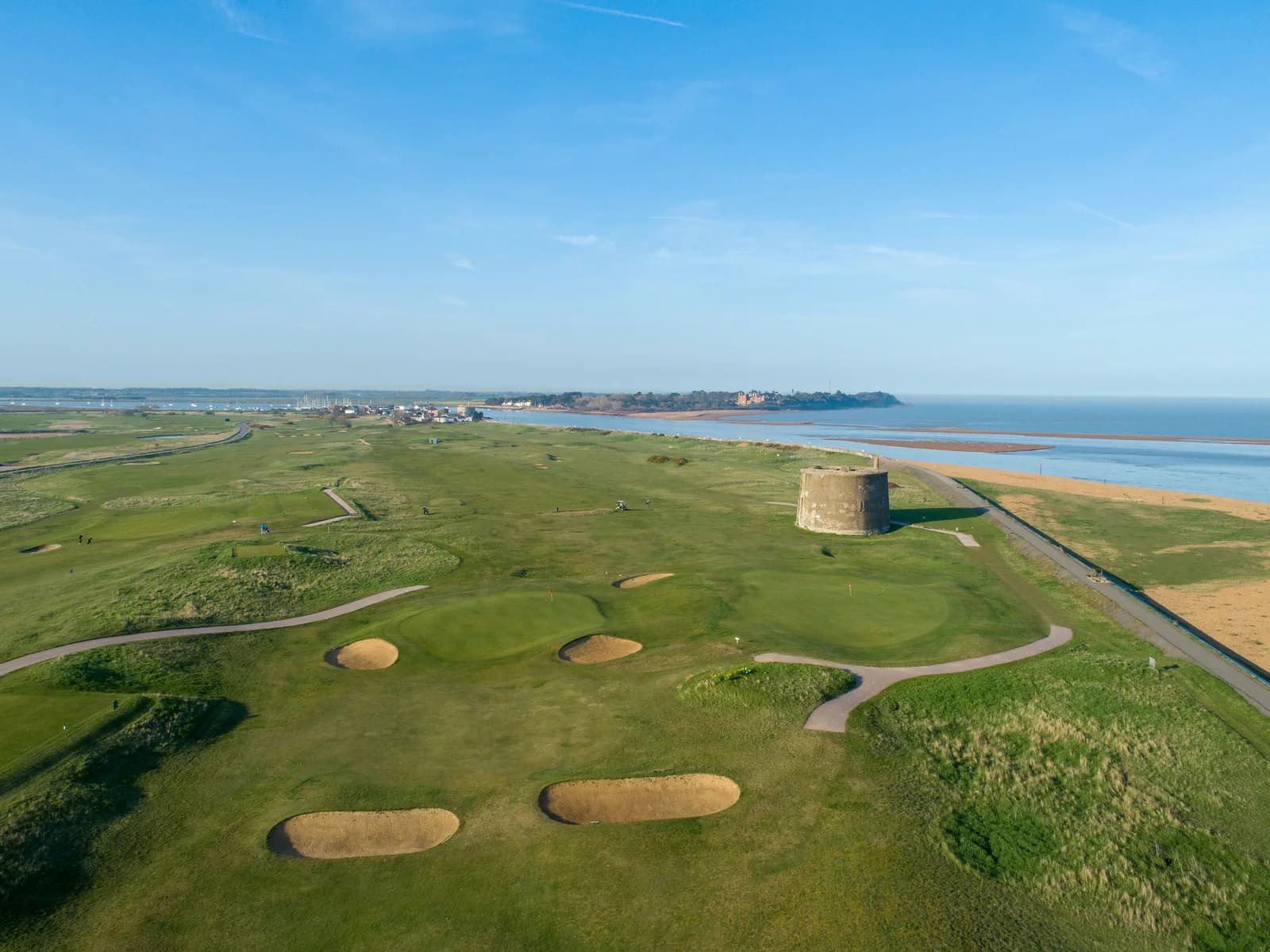 Aerial view of Felixstowe Ferry Golf Club's links course, clubhouse and driving range at Felixstowe Ferry