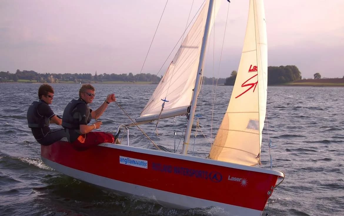Sailing dinghies on Alton Water reservoir at Alton Watersports Centre, Suffolk
